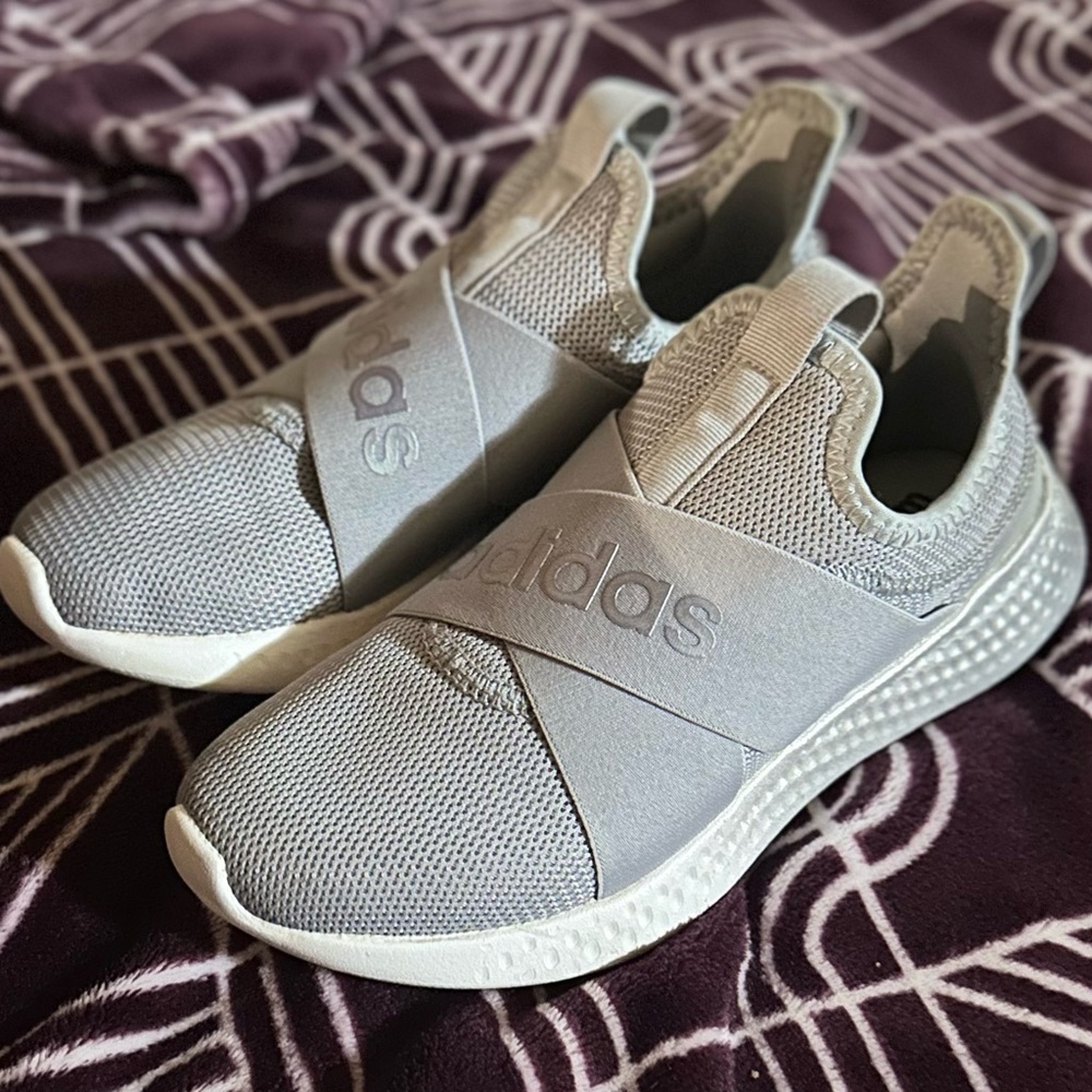 Like new Adidas slip ons.  Only worn 1 time.  Size 5